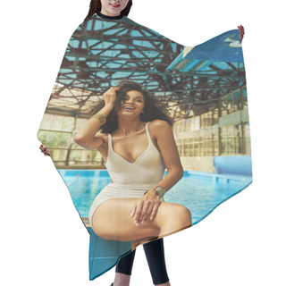 Personality  Excited African American Woman In Bathing Suit Sitting By Swimming Pool With Blue Water Hair Cutting Cape
