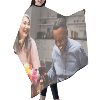 Personality  African American Man And Asain Woman Smiling During Dinner  Hair Cutting Cape