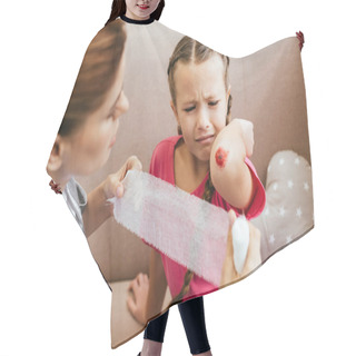 Personality  Worried Mother Wounding Bandage Around Elbow Of Crying Daughter Hair Cutting Cape