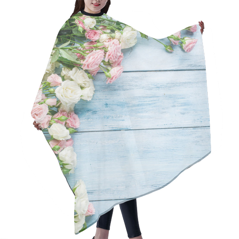 Personality  Delicate Fresh Roses On The Blue Wooden Background.  Hair Cutting Cape