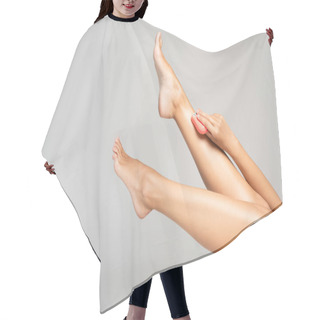 Personality  Cropped View Of Woman With Legs In Air Using Epilator Isolated On Grey  Hair Cutting Cape