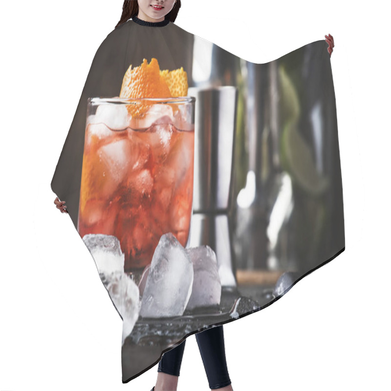Personality  Americano Alcohol Cocktail With Red Vermouth, Bitter, Soda, Orange Zest And Ice, Dark Wooden Bar Counter Background, Bar Tools, Selective Focus Hair Cutting Cape