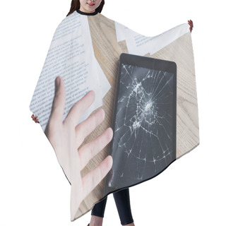 Personality  Cropped View Of Man With Hand Near Smashed Digital Tablet And Documents On Wooden Background Hair Cutting Cape