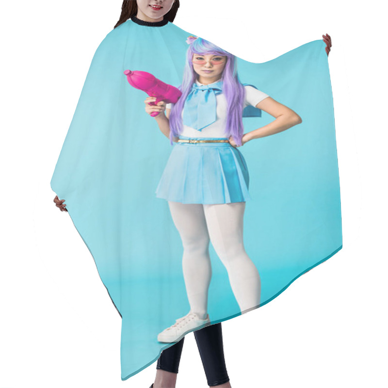 Personality  Full Length View Of Asian Anime Girl In Wig And Glasses Holding Water Gun On Blue Hair Cutting Cape