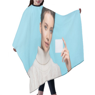 Personality  Brunette Model In Knitted Sweater Holding Blank Card Isolated On Blue, Banner  Hair Cutting Cape