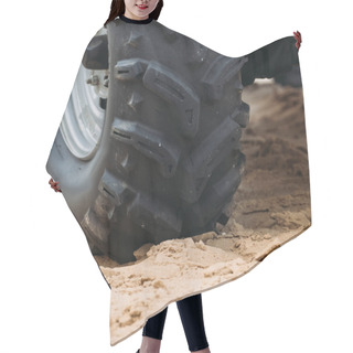 Personality  Cropped Shot Of Wheel Of All-terrain Vehicle On Sand Hair Cutting Cape