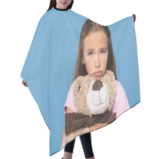 Personality  Sad Girl Holding Soft Toy And Looking At Camera Isolated On Blue  Hair Cutting Cape