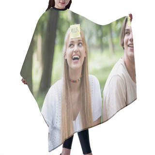 Personality  Smiling Teenager With Sticker Playing Who I Am With Friend Outdoors  Hair Cutting Cape