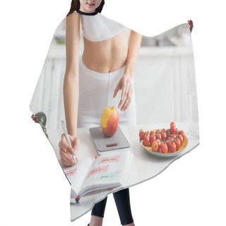 Personality  Cropped View Of Fit Sportswoman Writing Calories While Weighing Apple On Kitchen Table, Calorie Counting Diet Hair Cutting Cape