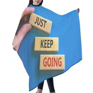 Personality  Just Keep Going Symbol. Wooden Blocks With Words 'Just Keep Going'. Beautiful Blue Background, Businessman Hand. Business, Just Keep Going Concept, Copy Space. Hair Cutting Cape