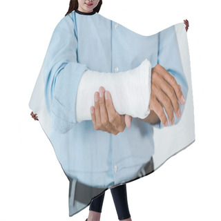 Personality  Cropped View Of Injured Man Touching Broken Arm Wrapped In Gypsum Bandage  Hair Cutting Cape