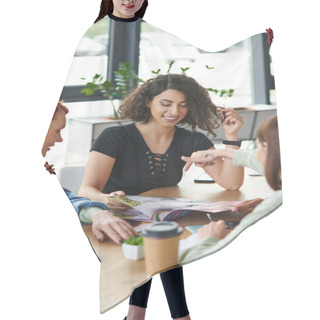 Personality  Young Woman Pointing At Magazine Near Smiling Multicultural Girlfriends And Paper Cups With Coffee To Go On Table In Women Club, Common Interests And Knowledge-sharing Concept Hair Cutting Cape