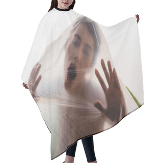 Personality  Brunette Woman Screaming Through Polyethylene On White, Ecology Concept Hair Cutting Cape