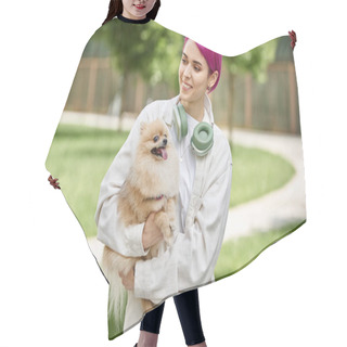 Personality  Smiley Purple-haired Woman With Headphones Walking With Adorable Purebred Doggy In Hands Outdoors Hair Cutting Cape