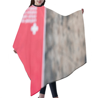 Personality  Unfocused Swiss Passport On A Brown Wooden Table With Copy Space Hair Cutting Cape