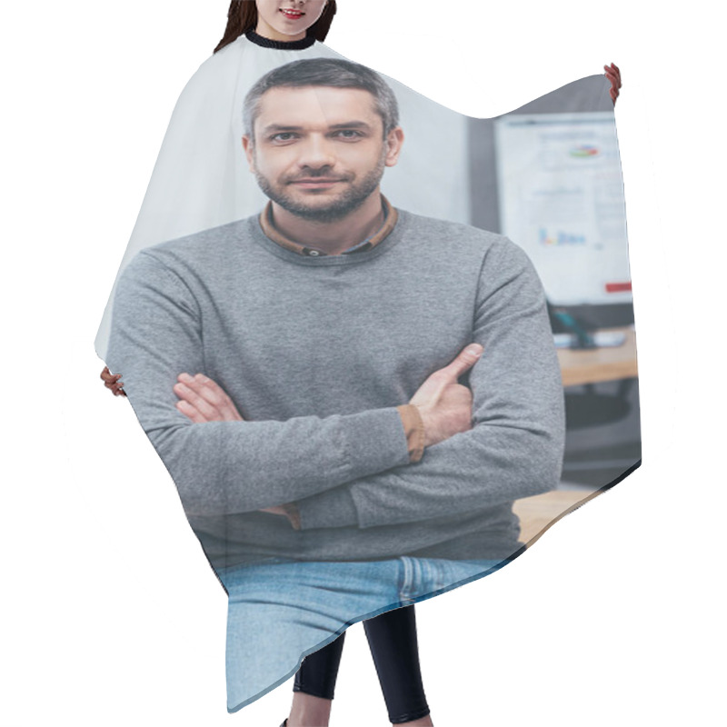 Personality  Handsome Bearded Businessman Sitting On Table With Crossed Arms And Looking At Camera Hair Cutting Cape