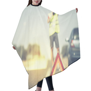 Personality  Emergency Triangle With Man And Car In The Background. Hair Cutting Cape