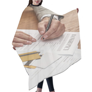 Personality  Partial View Of Businessman Filling In Bankruptcy Form At Wooden Table With Documents And Credit Cards Hair Cutting Cape