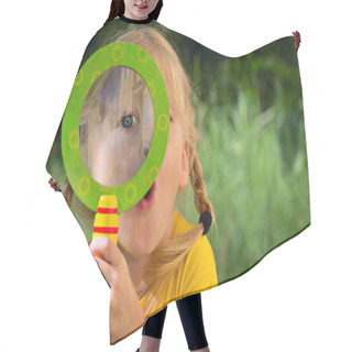 Personality  Girl With Surprise Looks Through A Magnifying Glass Hair Cutting Cape