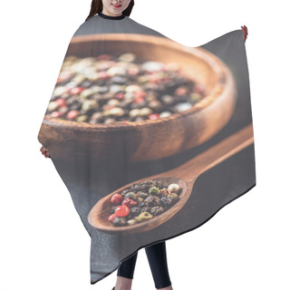 Personality  Close-p View Of Wooden Spoon And Bowl With Dried Aromatic Peppercorns On Black Hair Cutting Cape