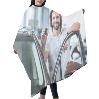Personality  Portrait Of Happy Man With Car Key Standing At New Car In Dealership Salon Hair Cutting Cape