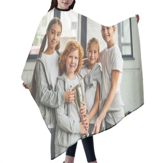Personality  Four Joyous Preadolescent Children In Grey Sportswear Posing With Trophy In Gym, Child Sport Hair Cutting Cape