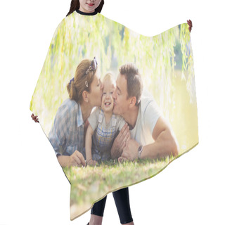 Personality  Happy Parents Kissing Toddler Boy. Father, Mother And Son Relaxing On The Lawn. Hair Cutting Cape