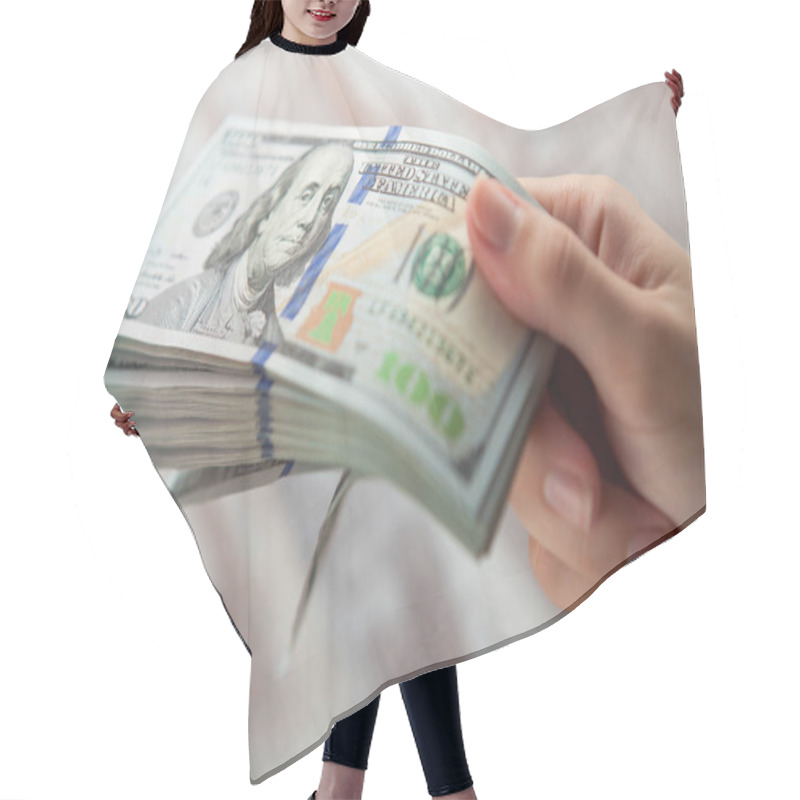 Personality  woman holding  dollars hair cutting cape