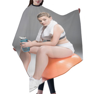 Personality  Young Overweight Woman With Towel And Bottle Of Water Sitting On Fit Ball And Looking At Camera On Grey  Hair Cutting Cape
