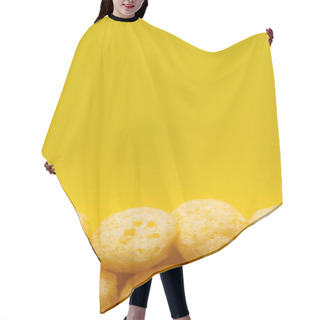 Personality  Top View Of Puffed And Tasty Cheese Pops On Yellow Hair Cutting Cape