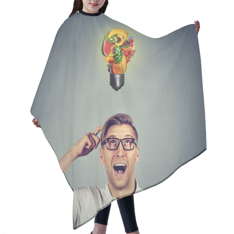 Personality  Eating Healthy. Man Looking Up Light Bulb Made Of Fruits Hair Cutting Cape