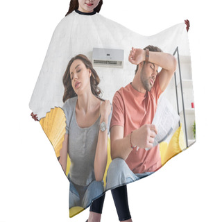 Personality  Pretty Woman With Hand Fan And Handsome Man With Newspaper Suffering From Heat At Home Hair Cutting Cape