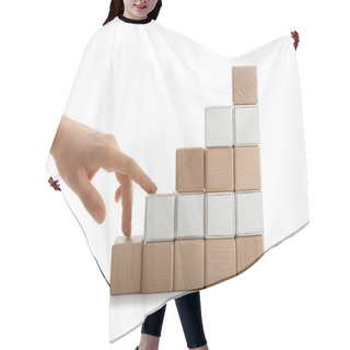 Personality  Stacked Cubes And Female Hand Imitating Walking Upstairs Against White Background. Concept Of Progress Hair Cutting Cape