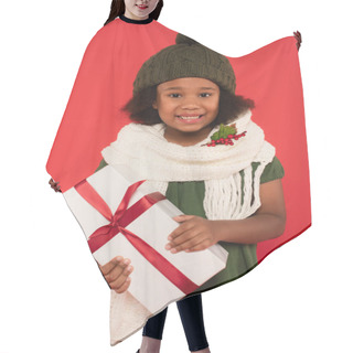 Personality  Cheerful African American Kid With Mistletoe On Scarf Holding Gift Box On Red Background Hair Cutting Cape