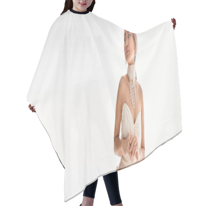 Personality  Banner Of Asian Woman In White Dress Restrained Posing And Looking To Side On White Background Hair Cutting Cape