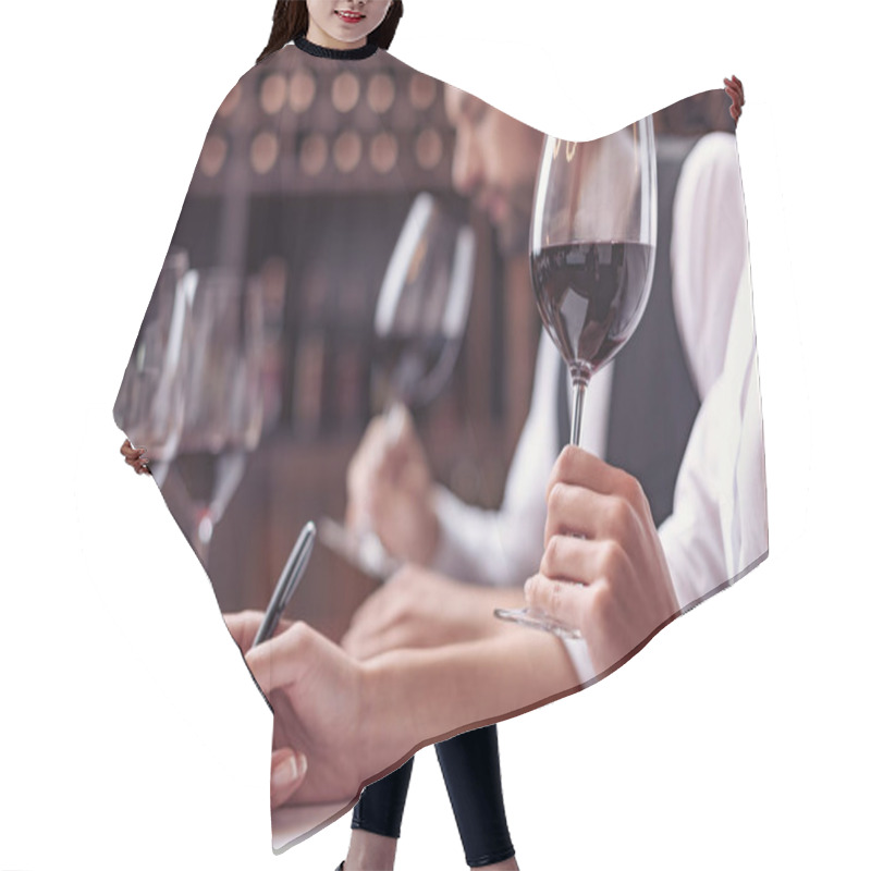 Personality  Sommeliers tasting wine in cellar hair cutting cape