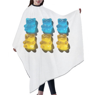 Personality  Top View Of Blue And Yellow Gummy Bears On White Background  Hair Cutting Cape