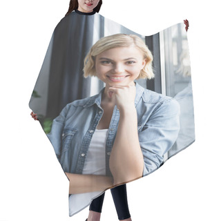 Personality  Portrait Of Smiling Blonde Woman Standing Near Window Hair Cutting Cape