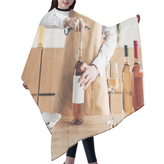 Personality  Cropped View Of Sommelier In Apron Opening Bottle Of Wine At Table Hair Cutting Cape