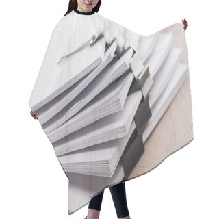 Personality  Close Up View Of Stacks Of Blank Paper With Metal Binder Clips  Hair Cutting Cape