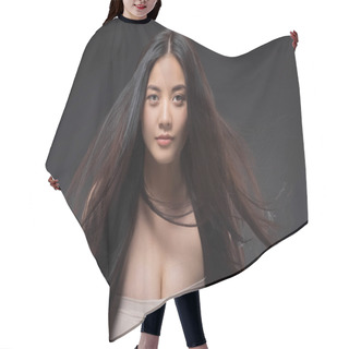 Personality  Portrait Of Pretty Asian Woman With Healthy And Strong Hair Looking At Camera Isolated On Black Hair Cutting Cape