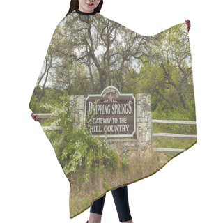 Personality  Dripping Springs, Texas USA - April 6, 2016: Welcome To Dripping Springs Sign From This Small Town In The Texas Hill Country. Hair Cutting Cape