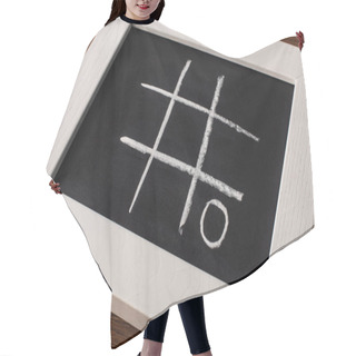 Personality  Tic Tac Toe Game On Blackboard With Chalk Grid And Naught On Wooden Surface Hair Cutting Cape