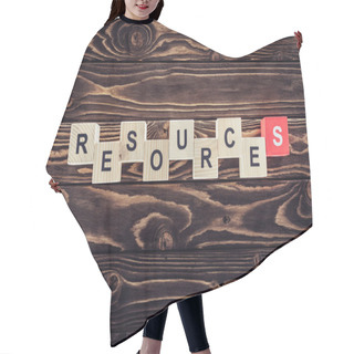 Personality  Top View Of Wooden Blocks Arranged In Resources Word On Brown Wooden Surface Hair Cutting Cape