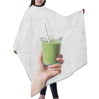 Personality  Female Hand Holding Glass With Green Organic Smoothie And Straw Hair Cutting Cape