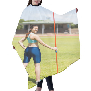 Personality  Portrait Of Female Athlete Standing With Javelin Hair Cutting Cape