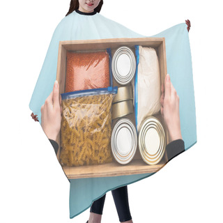 Personality  Cropped View Of Woman Holding Wooden Box With Cans And Groats In Zipper Bags On Blue Background Hair Cutting Cape