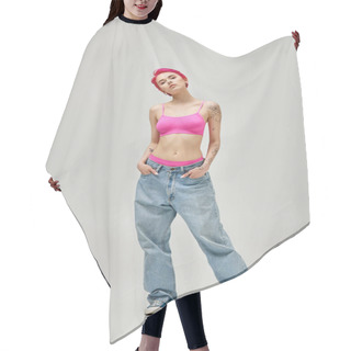 Personality  Alluring Woman With Short Pink Hair And Tattoos In Pink Crop Top And Jeans With Hands In Pockets Hair Cutting Cape