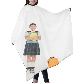 Personality  Happy Schoolgirl Standing With Notebooks In Hands Near Backpack, Back To School Concept, Student Hair Cutting Cape