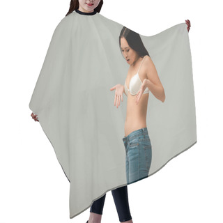 Personality  Displeased And Overweight Asian Woman Gesturing And Looking At Jeans Isolated On Grey Hair Cutting Cape